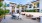 Outdoor lounge at our senior living community in Palm Desert, featuring outdoor couches, tables, and string lights.