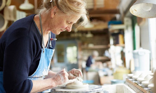 woman making pottery 